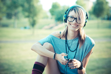 young beautiful model woman listening music