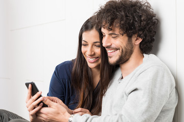 Wall Mural - Couple With Cell Phone