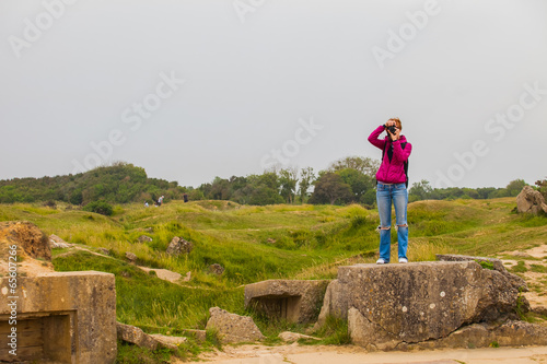 Poster Old broken German bunkers of Atlantic Wall on Pointe-Du-Hoc. Wes
