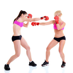 Wall Mural - sport training of two boxing young woman, studio over white