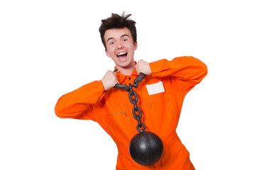 Young inmate with chains isolated on the white