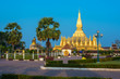 King Setthathirat statue and Pha That Luang stupa