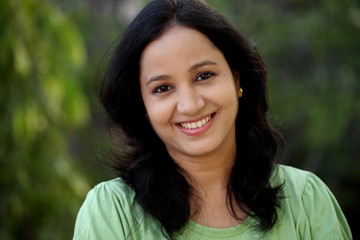 Portrait of young woman at outdoors