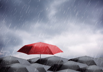 Umbrellas under rain and thunderstorm