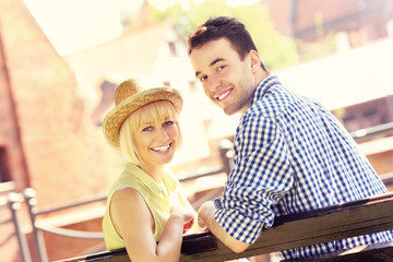 Poster - Happy couple resting on a bench