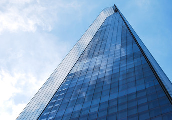 The Shard of Glass London towers into blue sky