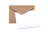 Fototapeta Na ścianę - brown envelope with a blank white card over white