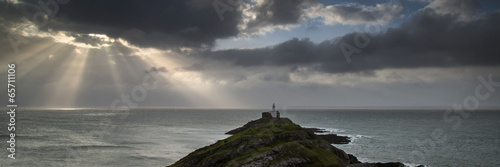 Obraz na płótnie canvas dwuczęściowy "dyptyk" Panorama pejzaż mumbles latarnia morska walia z sunbeams