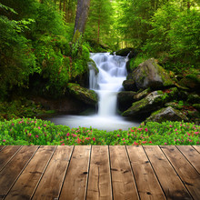 Beautiful Waterfall In Green Forest