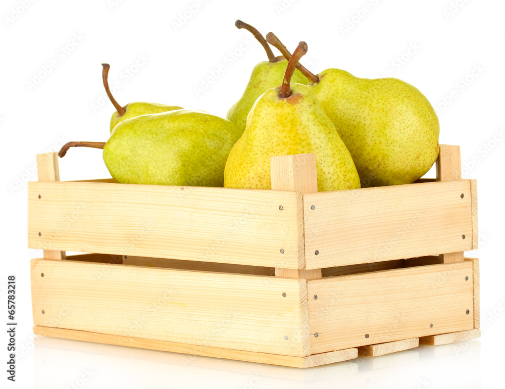 Ripe pears in wooden box isolated on white