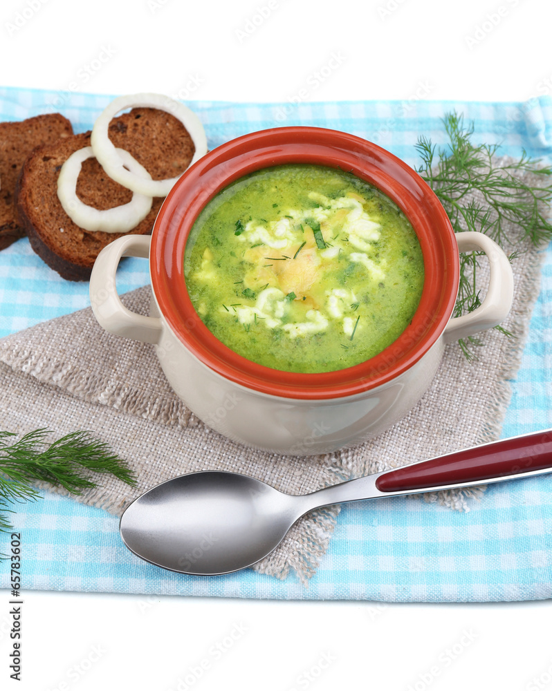 Tasty soup in saucepan, isolated on white