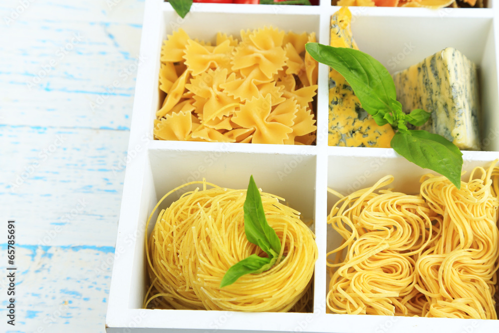 Italian pasta in wooden box close-up