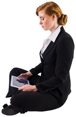 Poster - Redhead businesswoman using her tablet pc