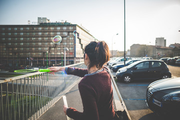 Wall Mural - young beautiful hipster woman bubble blower