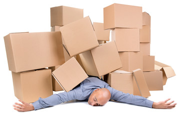 Businessman under boxes