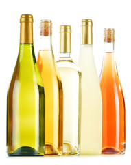 Wall Mural - Composition with variety of wine bottles isolated on white