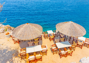 Wall Mural - beautiful cafe by the sea in Hydra island in Greece