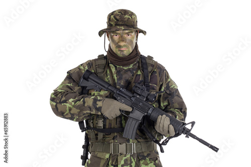 Fotografie, Obraz Soldier in camouflage and modern weapon M4.