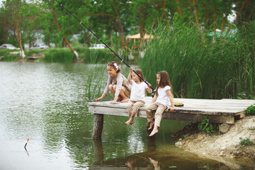 Wall Mural - Kids fishing