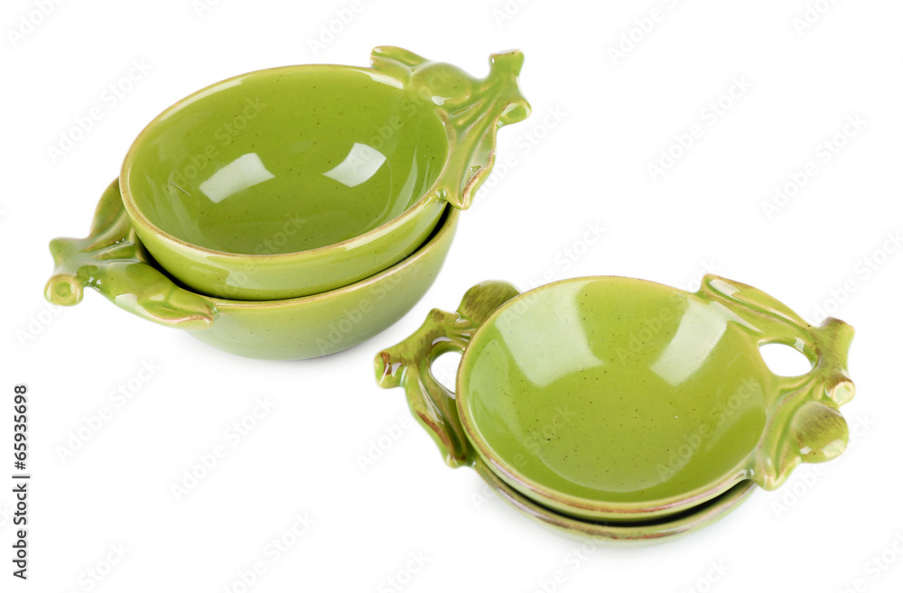 Green empty bowls for olive oil and olives  isolated on white