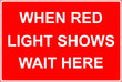 © Peter - When red light shows wait here sign