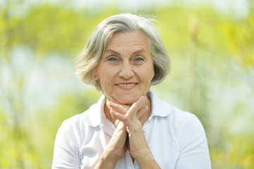 Wall Mural - Pensive elderly woman