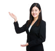 © leungchopan - Businesswoman present by hand