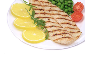 Wall Mural - Grilled fish fillet with vegetables.