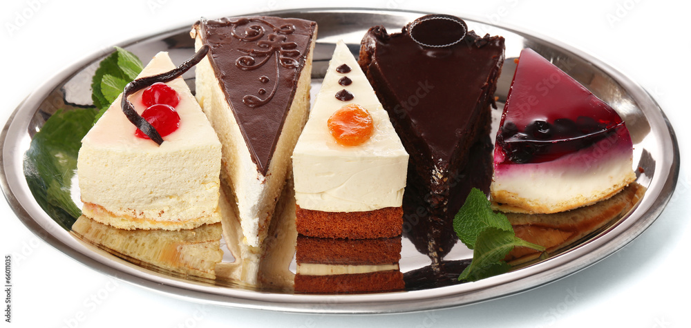 Assortment of pieces of cake, isolated on white