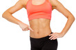 © Syda Productions - close up of woman pointing finger at her six pack