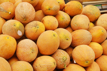 Wall Mural - Close up of melons on market stand