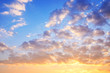 © JJIMAGE - Yellow blue sunset sky with sunlight