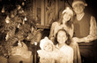 © JackF - Vintage image of happy family with  Christmas tree