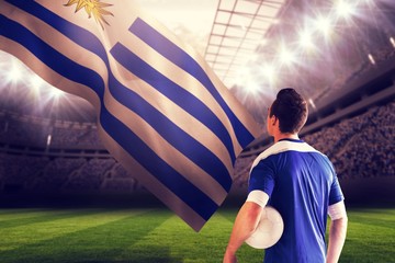 Poster - Composite image of handsome football player in blue jersey