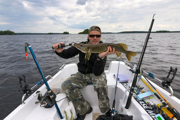 Wall Mural - Boat fishing after pike