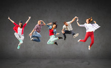 Group Of Teenagers Jumping