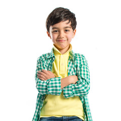 Happy brunette kid over isolated white background