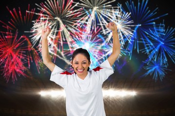 Wall Mural - Composite image of football fan in white cheering