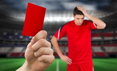 Poster - Composite image of hand holding up red card
