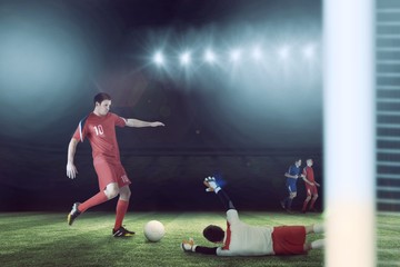 Poster - Composite image of football players tackling for the ball