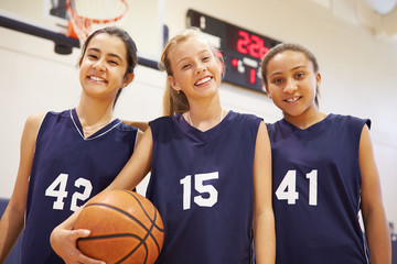 members of female high school basketball team