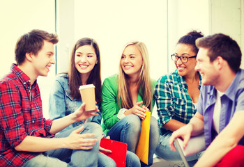 Canvas Print - students communicating and laughing at school