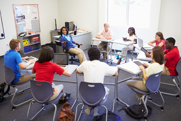 Wall Mural - High School Students Taking Part In Group Discussion