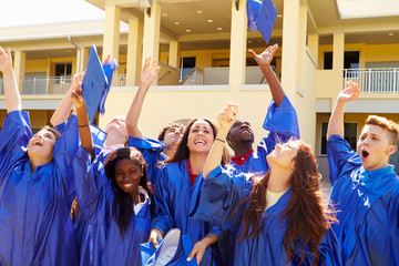 Wall Mural - group of high school students celebrating graduation