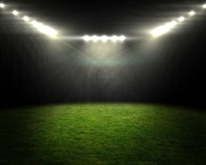 Wall Mural - Football pitch under bright spotlights