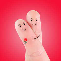 Sticker - happy couple embrace with flower concept, painted at fingers aga