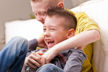 two little boys laughing