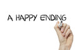 © ibreakstock - Hand writing a happy ending