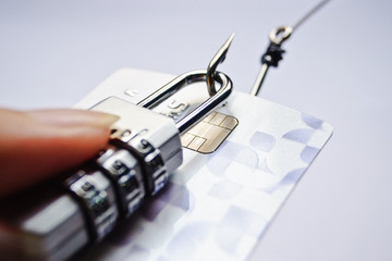 Wall Mural - security lock with password and fish hooks on credit cards