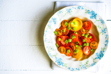 Wall Mural - Colorful tomatoes with onion